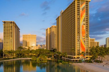 Hilton Hawaiian Village frames the shore in Waikiki Hawaii
