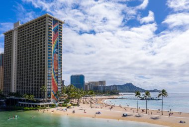Hilton Hawaiian Village frames the shore in Waikiki Hawaii