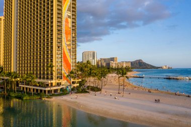 Hilton Hawaiian Village frames the shore in Waikiki Hawaii