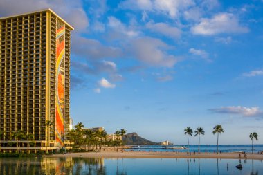Hilton Hawaiian Village frames the shore in Waikiki Hawaii