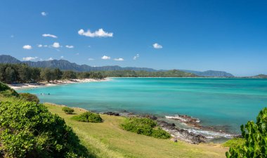 Tourists and locals on Kailua beach on east coast of Oahu