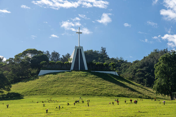 Large cross on top of the chapel in the Valley of the Temples memorial garden