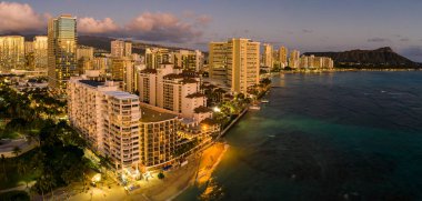 Aerial view of Waikiki beach towards Diamond Head at sunset