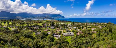 Aerial shot over Princeville with Hanalei Bay on north shore of Kauai in Hawaii clipart