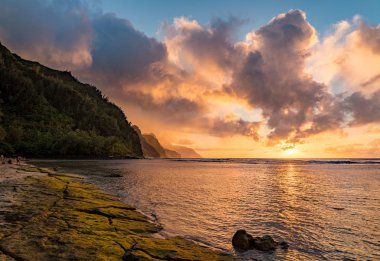 Sunset over the receding mountains of the Na Pali coast of Kauai in Hawaii