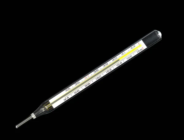 Isolated close view of mercury glass thermometer registering fever — Stock Photo, Image