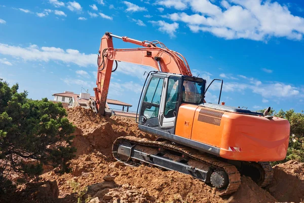 Grävmaskin loader maskin på byggarbetsplatsen — Stockfoto