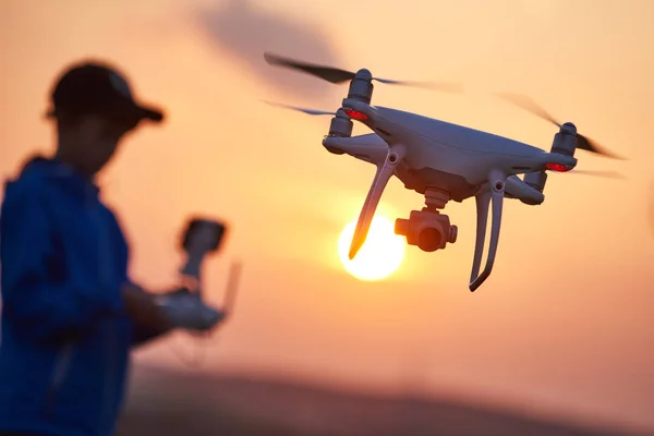 Drone flying at sunset — Stock Photo, Image