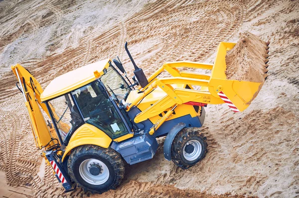 Loader excavator with backhoe at sandpit — Stock Photo, Image