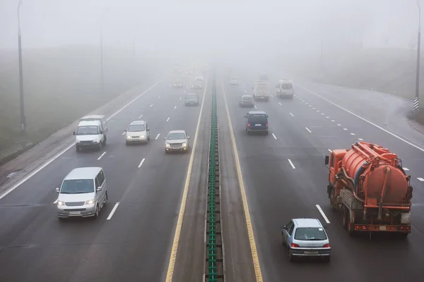 Fog over the highway road — Stock Photo, Image