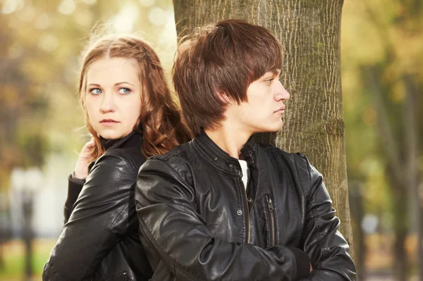 Relationship trouble or problem. Depressed woman and man in park — Stock Photo, Image