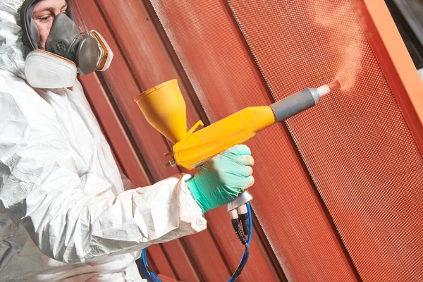 Polymer coating of metal detail with powder spraying gun — Stock Photo, Image