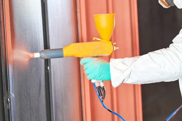 Polymer coating of metal detail with powder spraying gun — Stock Photo, Image