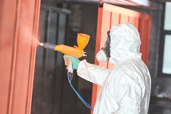 Polymer coating of metal detail with powder spraying gun — Stock Photo, Image