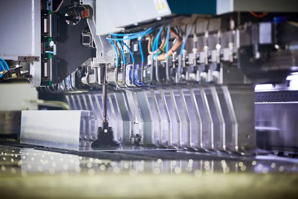 Panel bending machine at work. process of metal sheet forming — Stock Photo, Image