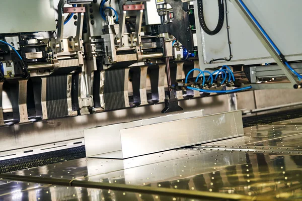 Panel bending machine at work. process of metal sheet forming — Stock Photo, Image