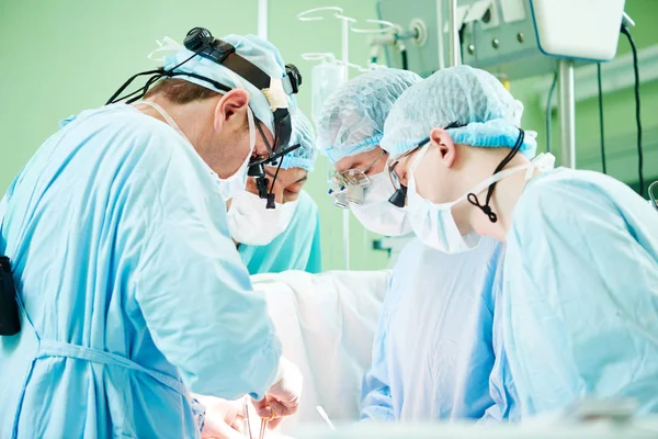 Male cardiac surgeon at child cardiosurgery operating room — Stock Photo, Image