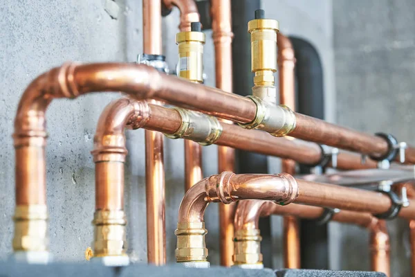 Plumbing service. copper pipeline of a heating system in boiler room — Stock Photo, Image