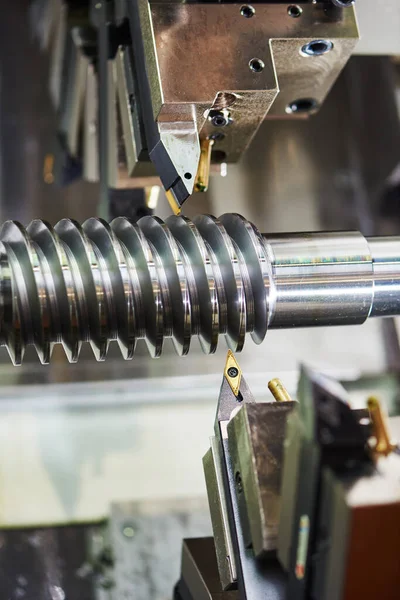Cutting tool at metal working. Spiral pinion shaft machining — Stock Photo, Image