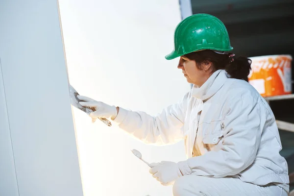 Plasterer at indoor wall work — Stock Photo, Image