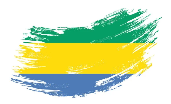 Gabon flag grunge brush background. Vector illustration. — Stockvector