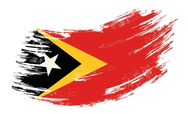 Timor-Leste flag grunge brush background. Vector illustration. — 스톡 벡터