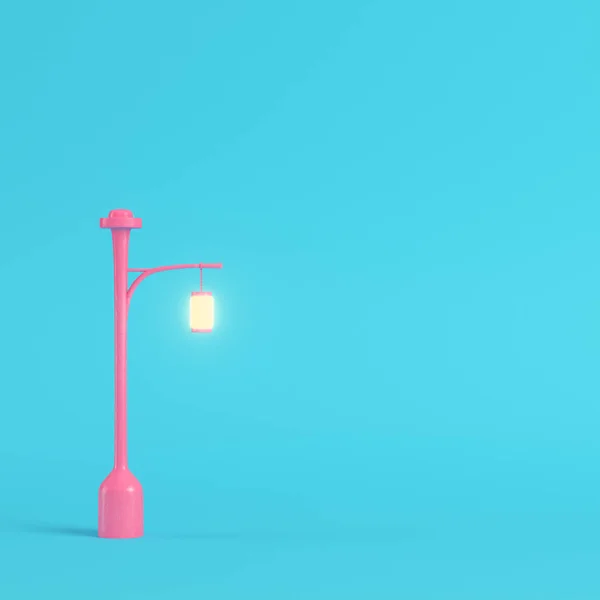 Pink street light on bright blue background in pastel colors — 스톡 사진