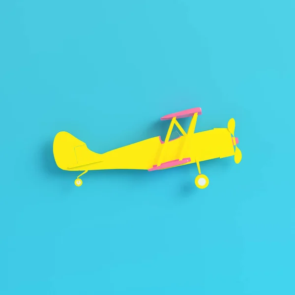 Yellow biplane on bright blue background in pastel colors. Minim — Stockfoto