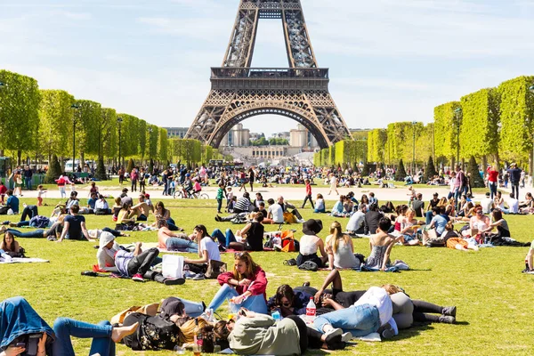 People on Champ de Mars with Eiffel Tower on background Stock Image