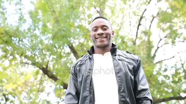 Black man portrait at park in Toronto — Stock Video