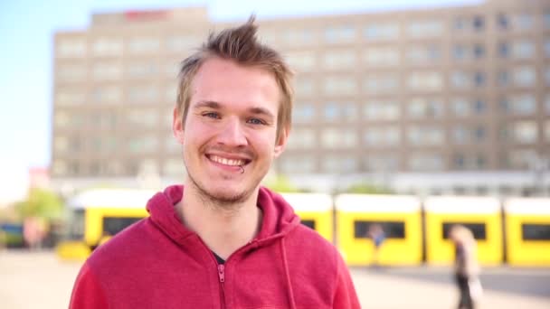 Young man portrait in the city — Stock Video