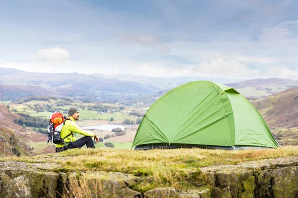 Man Explorer Tent Top Mountain Young Man Backpack Sitting Next Royalty Free Stock Images