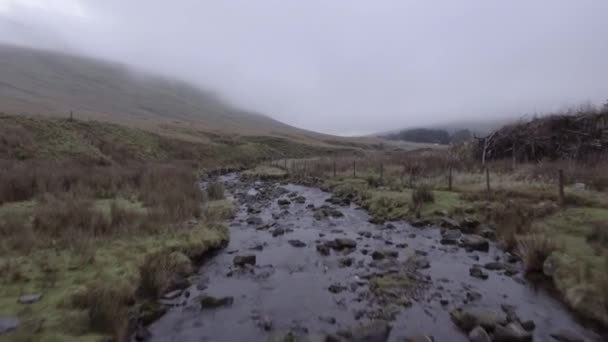 Aerial view of countryside road in Wales on a cloudy day — Stock Video