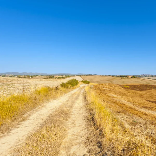 Tuscany landscape after harvest — Stock Photo, Image