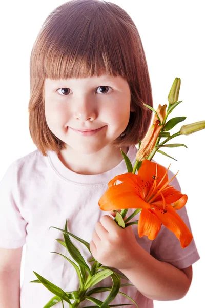 Kid holding orange lily — Stock Photo, Image