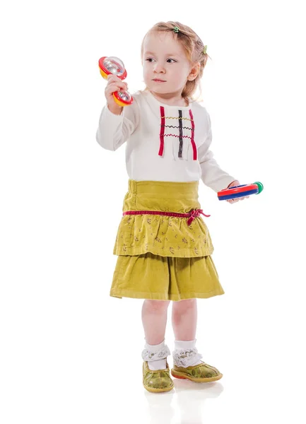 Girl playing rattle — Stock Photo, Image