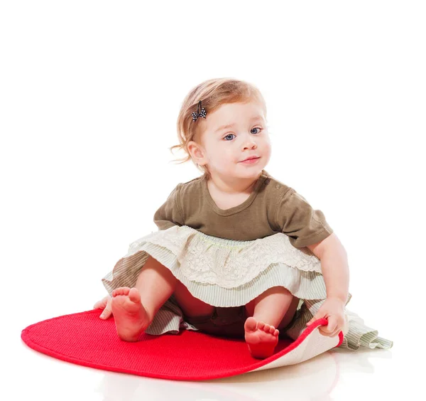 Menina criança sentada — Fotografia de Stock