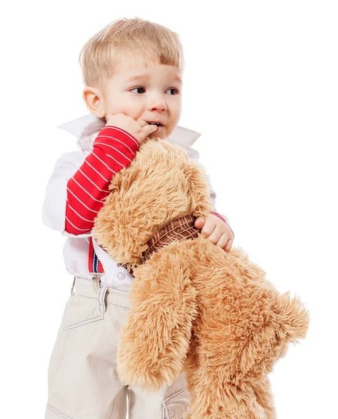 Menino abraçando urso — Fotografia de Stock