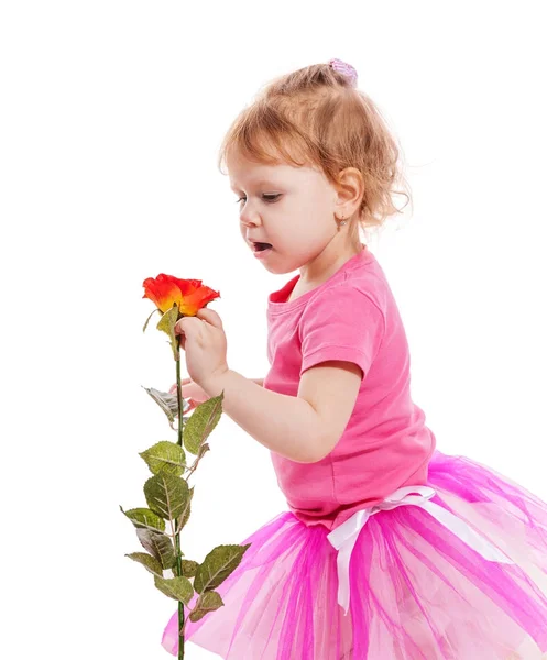 Little girl holding rose — Stock Photo, Image