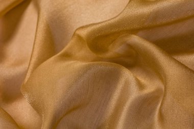 Bej renkli tekstil ile parlak kumaş arkaplan