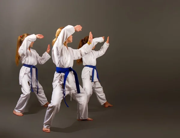 Three karate girls — Stock Photo, Image