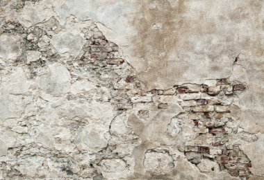 Eski duvar sıva altında tuğla ile