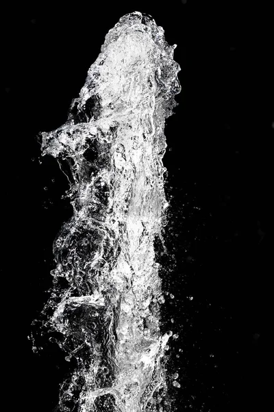 Salpicadura de agua sobre fondo negro —  Fotos de Stock