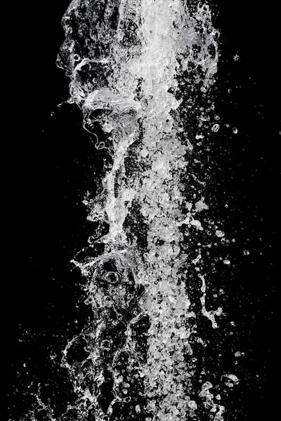 Water splash over black background