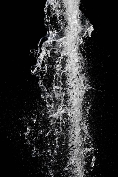 Water splash over black background