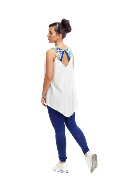 De jonge vrouw in handige kleding een weergave van een rug — Stockfoto