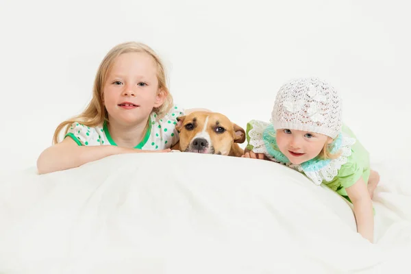 Two little girls and dog — Stock Photo, Image