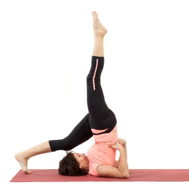 Yoga yaparken güzel Olgun kadın