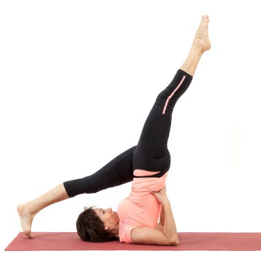 Yoga yaparken güzel Olgun kadın