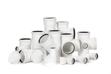metal-plastic plumbing couplings, adapters, plugs isolated on white background.